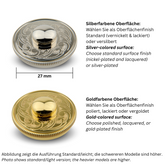ein Ventildeckel mit silberfarbener Oberfläche und ein Ventildeckel mit goldfarbener Oberfläche